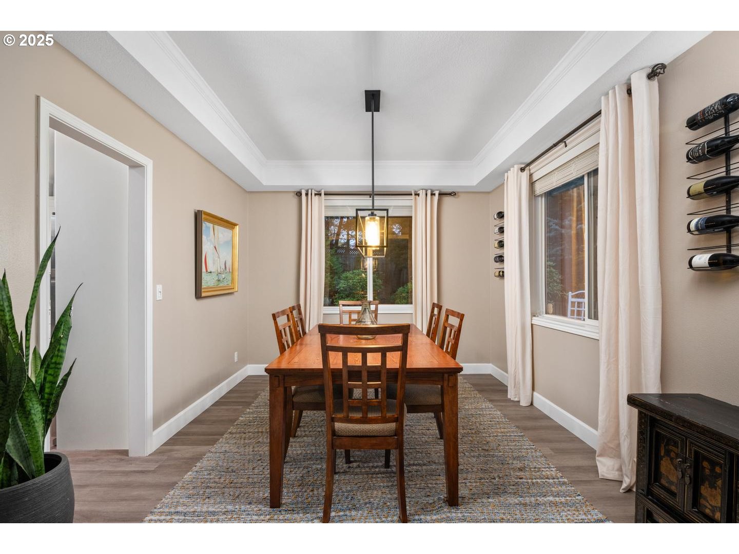 1626 Northwest Caitlin Terrace Portland, OR 97229 - Photo 12 of 48 a dining room with furniture potted plants and wooden floor