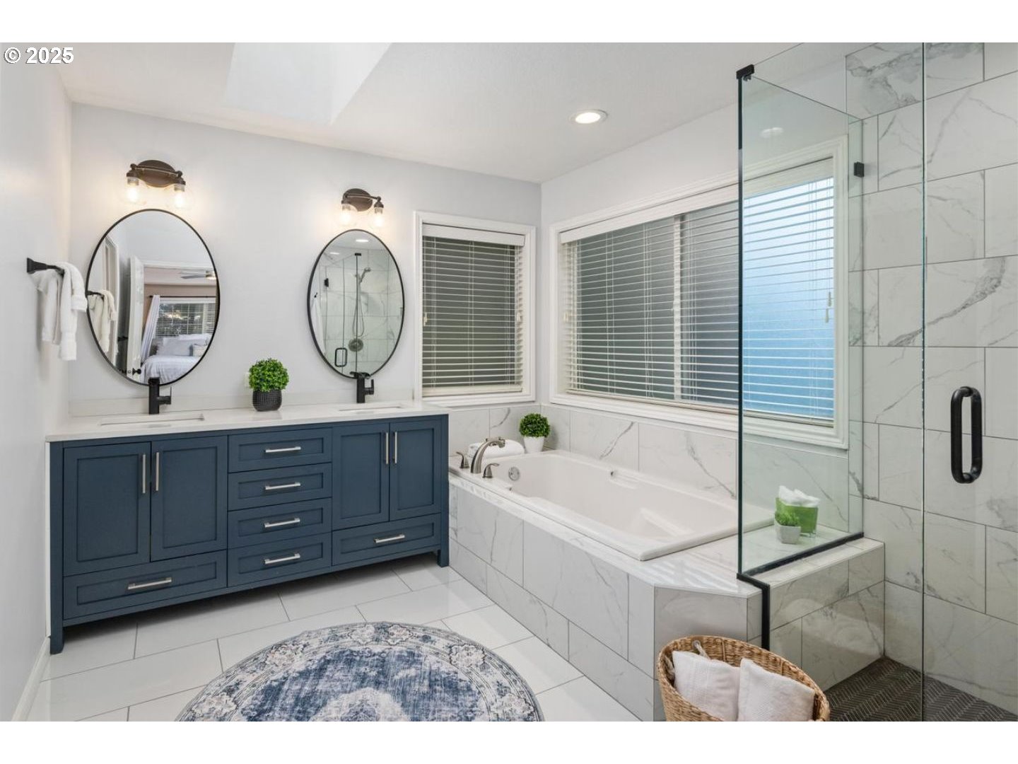 1626 Northwest Caitlin Terrace Portland, OR 97229 - Photo 20 of 48 a bathroom with a double vanity sink and a mirror