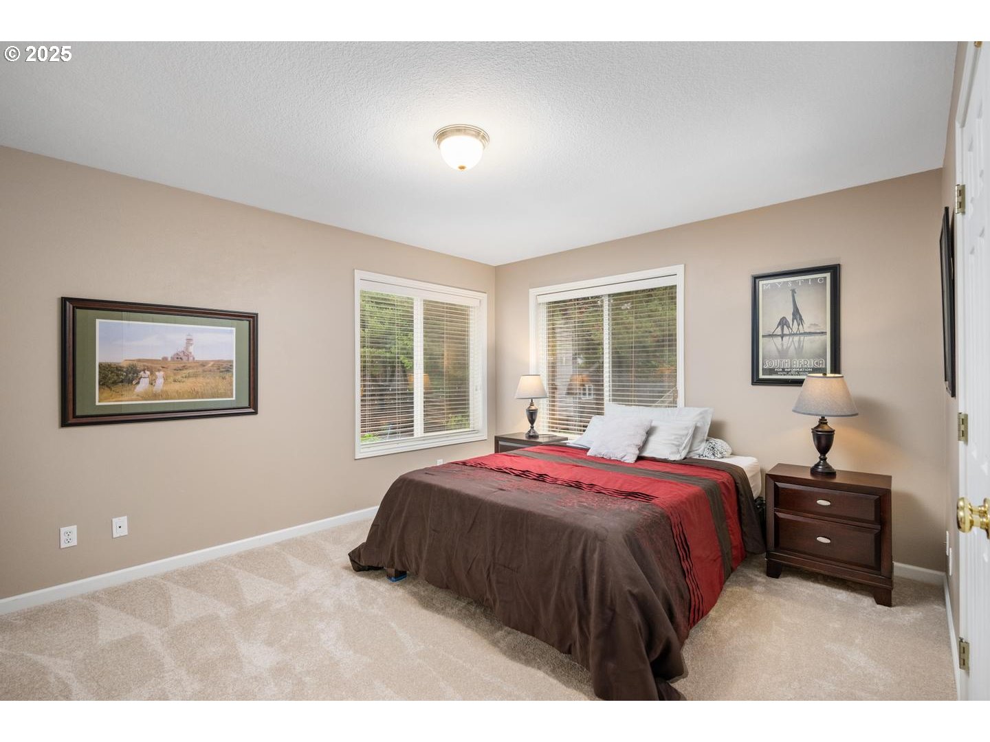 1626 Northwest Caitlin Terrace Portland, OR 97229 - Photo 24 of 48 a bedroom with a bed and window