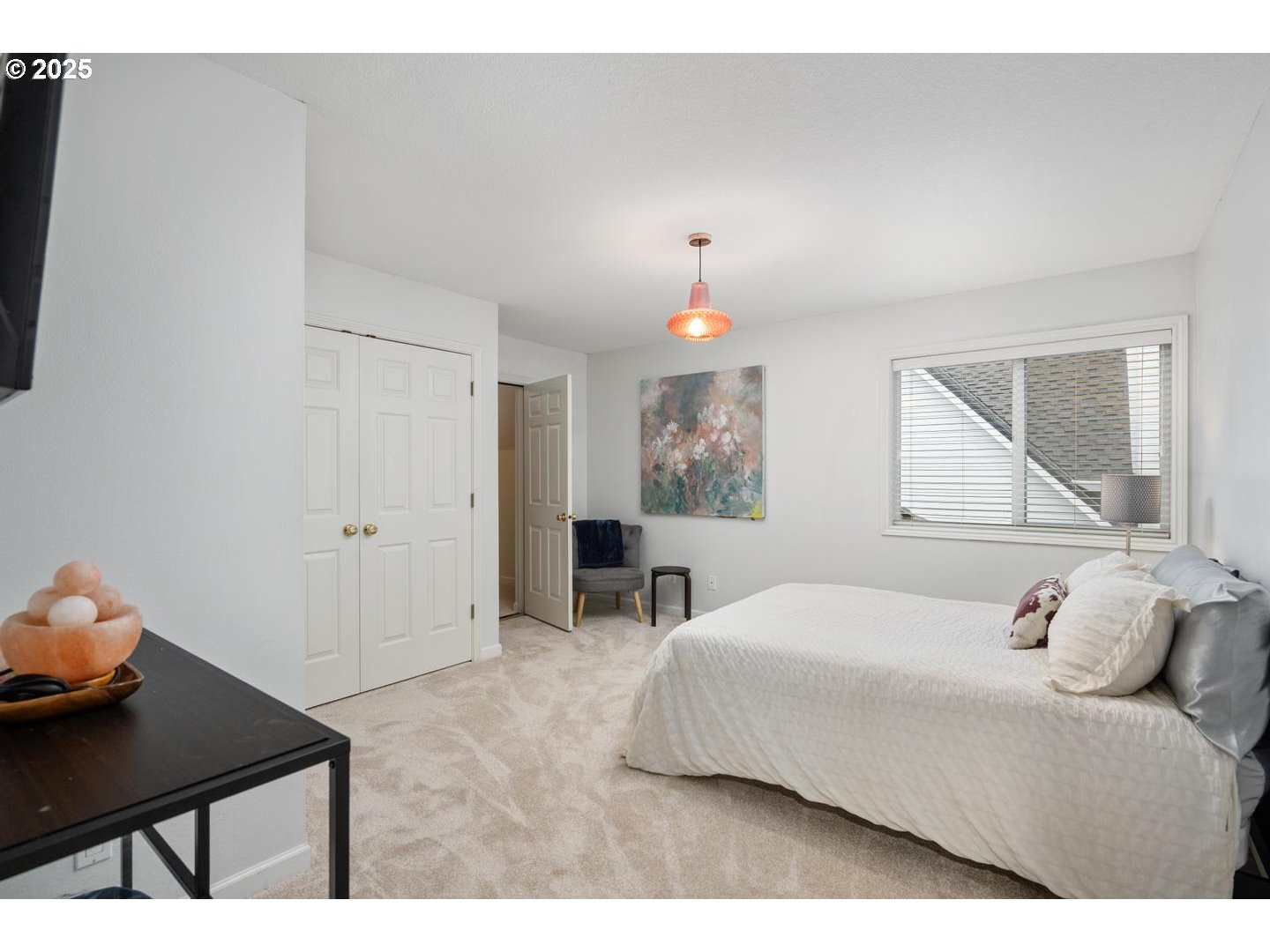 1626 Northwest Caitlin Terrace Portland, OR 97229 - Photo 25 of 48 a bedroom with a bed and a window