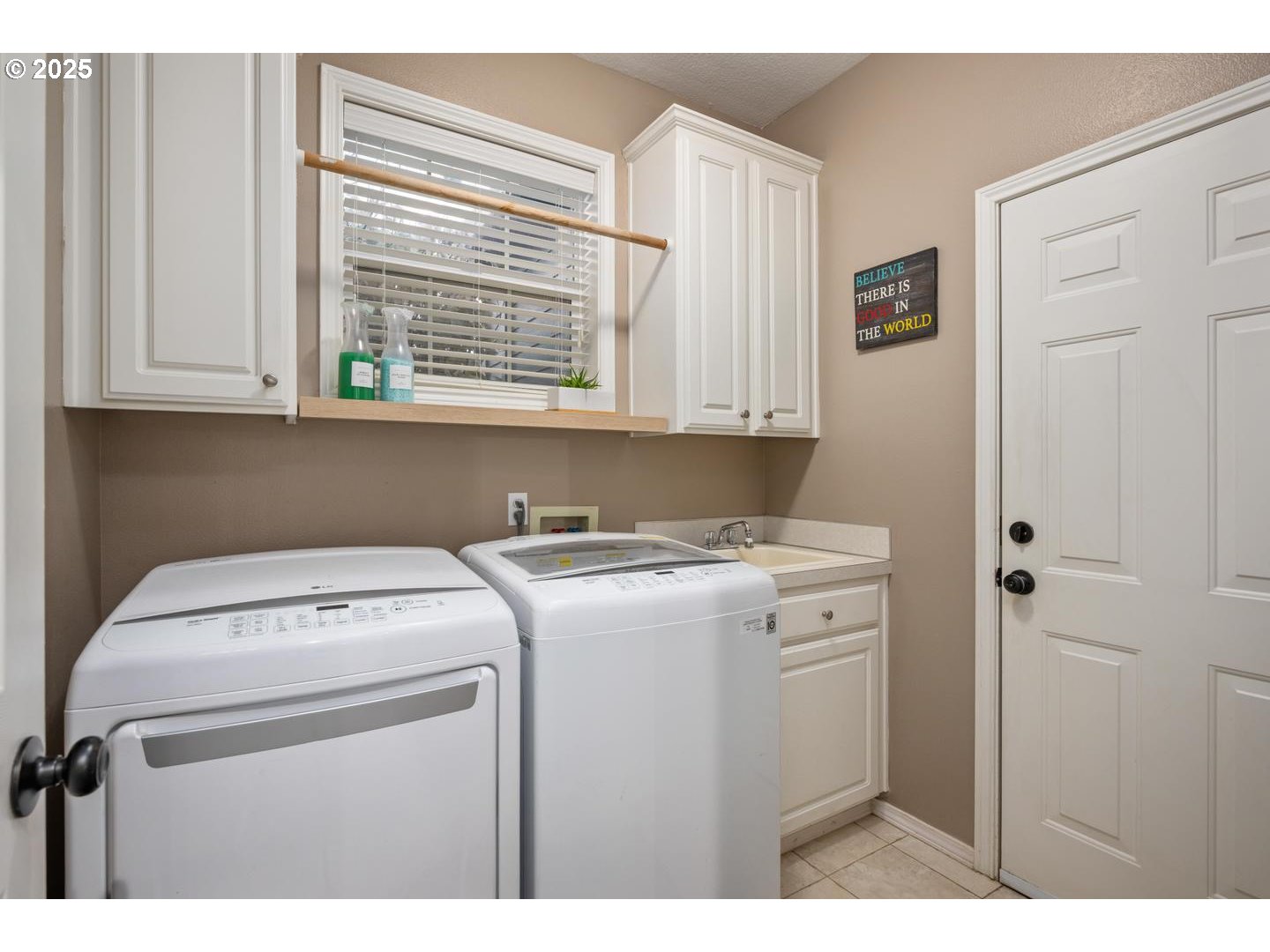 1626 Northwest Caitlin Terrace Portland, OR 97229 - Photo 28 of 48 a utility room with dryer and washer