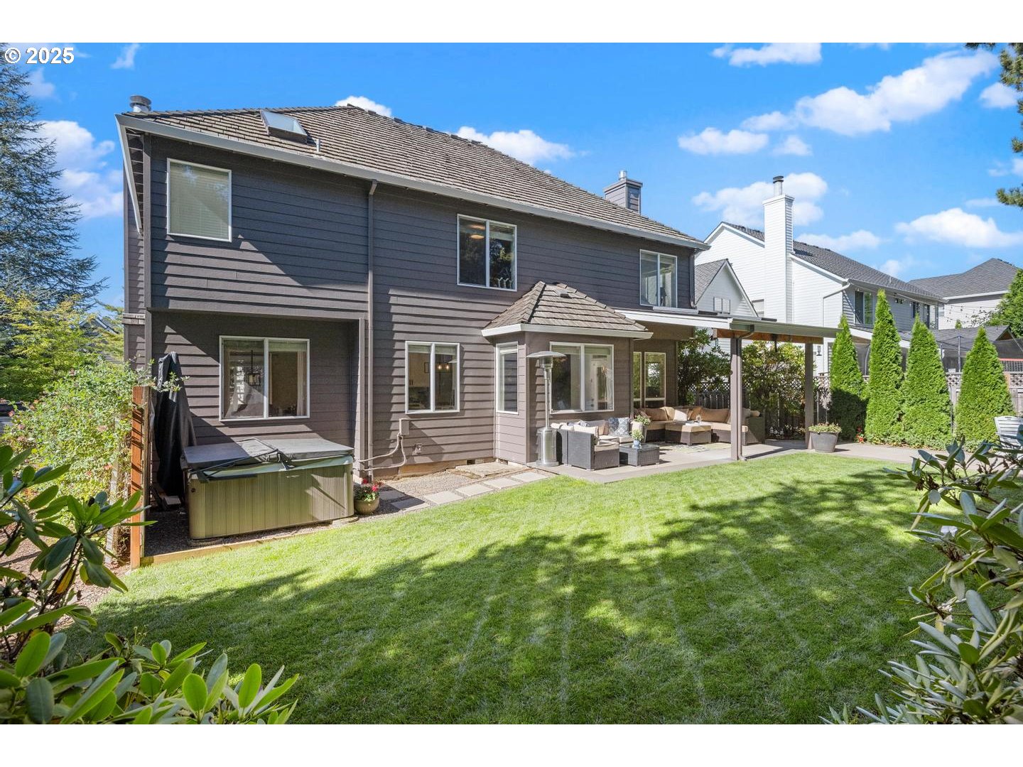 1626 Northwest Caitlin Terrace Portland, OR 97229 - Photo 30 of 48 a view of a house with a yard porch and sitting area