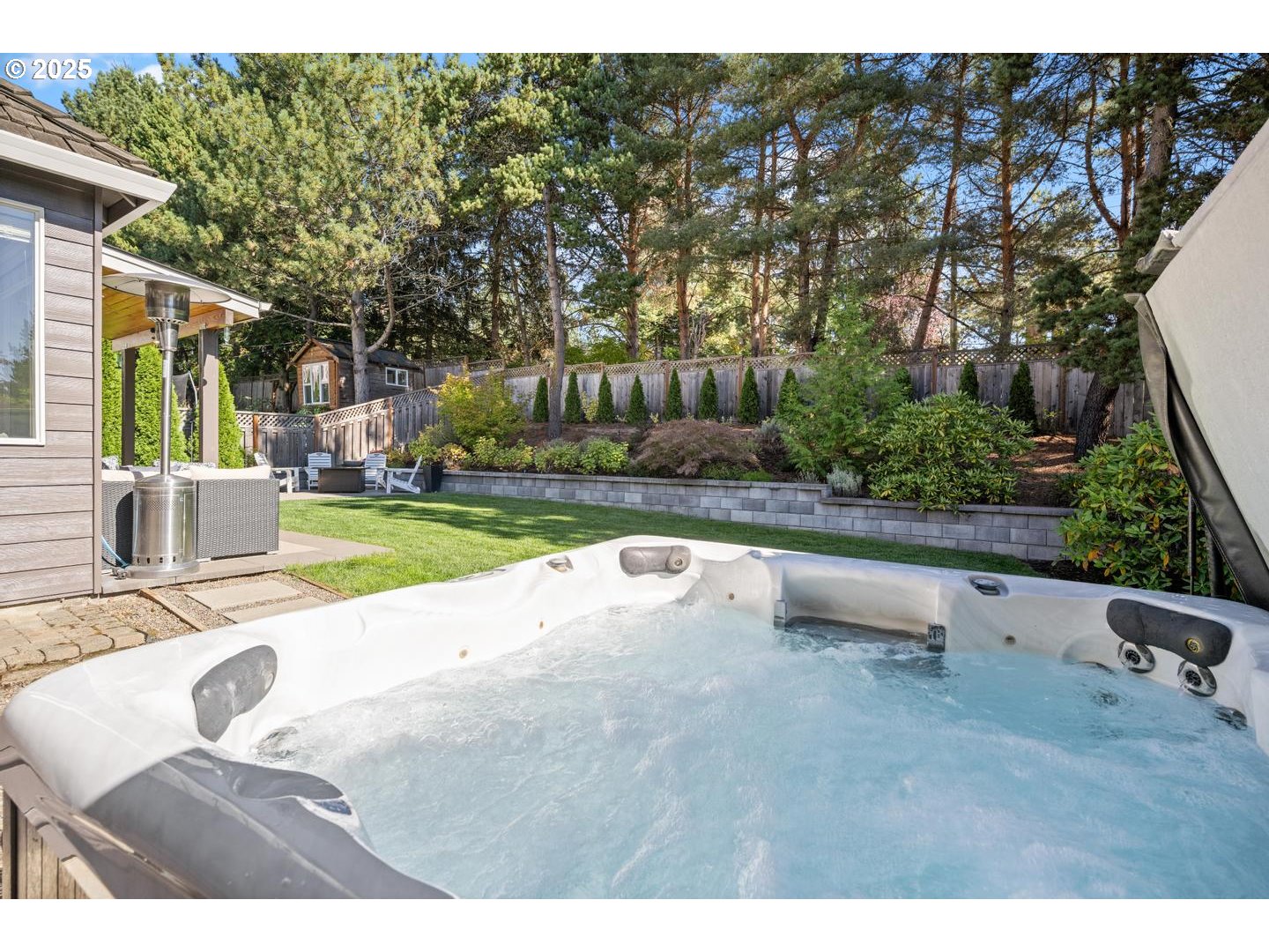 1626 Northwest Caitlin Terrace Portland, OR 97229 - Photo 39 of 48 a view of a backyard with a garden and entertaining space