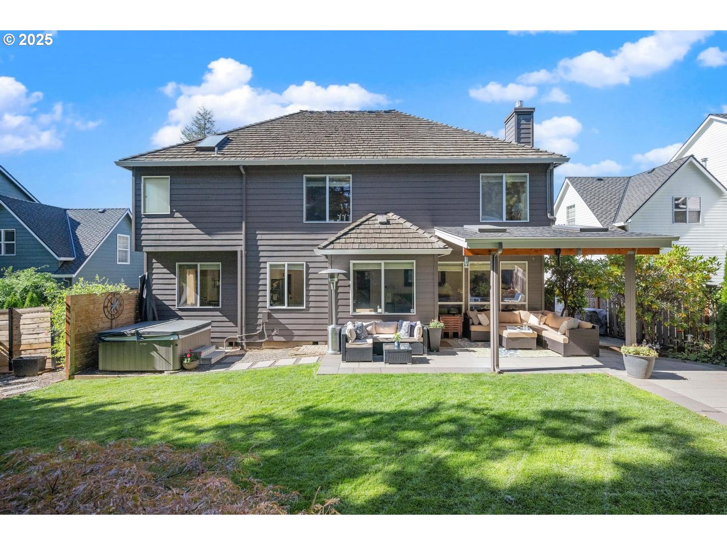 1626 Northwest Caitlin Terrace Portland, OR 97229 - Photo 4 of 48 a front view of a house with garden and patio
