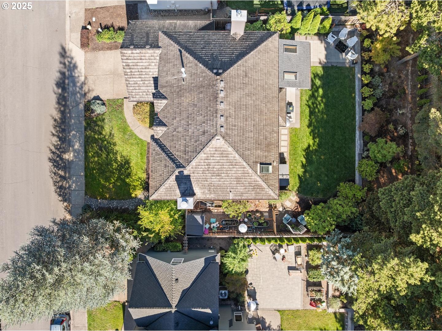 1626 Northwest Caitlin Terrace Portland, OR 97229 - Photo 47 of 48 an aerial view of a house with a yard swimming pool and outdoor seating