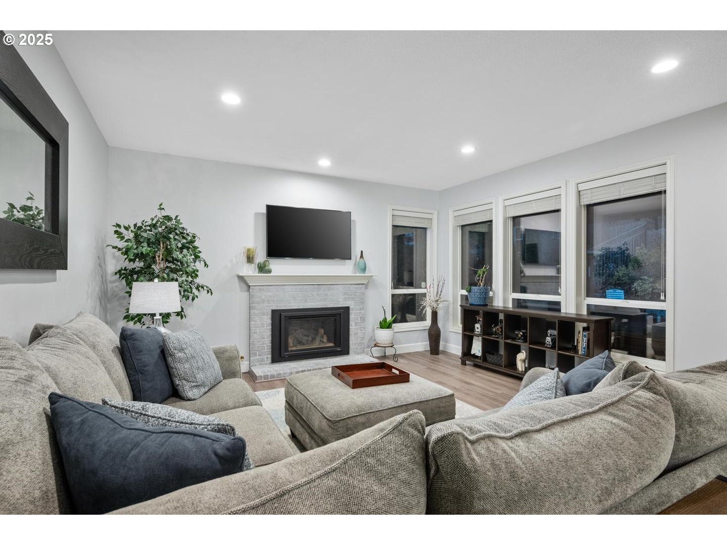 1626 Northwest Caitlin Terrace Portland, OR 97229 - Photo 9 of 48 a living room with furniture and a fireplace