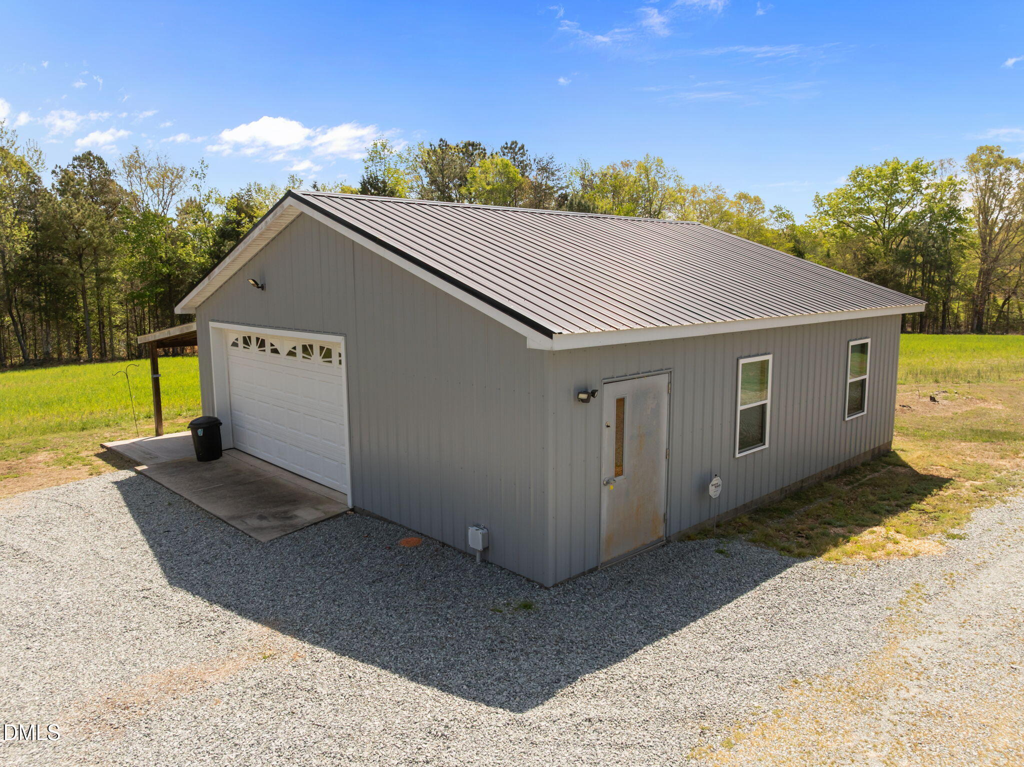 236 Dirgie Mine Road Roxboro, NC 27574 - Photo 40 of 55 a view of a house with a backyard