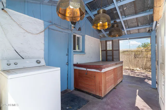 a kitchen with a stove and a fan
