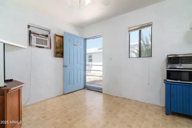 a view of empty room with front door