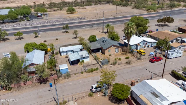 an aerial view of a house with a lake view