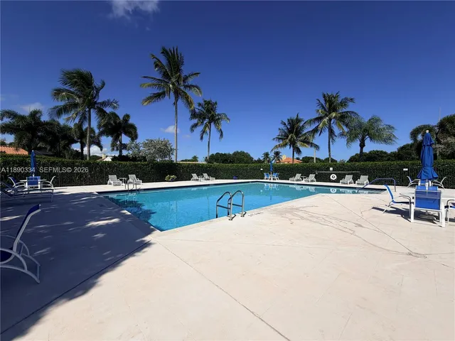 a view of outdoor space with swimming pool and patio