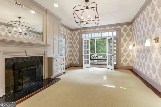a view of livingroom with window and fireplace