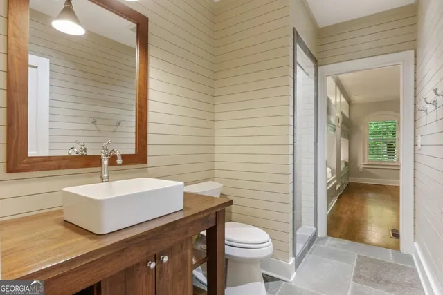 a view of balcony with wooden floor