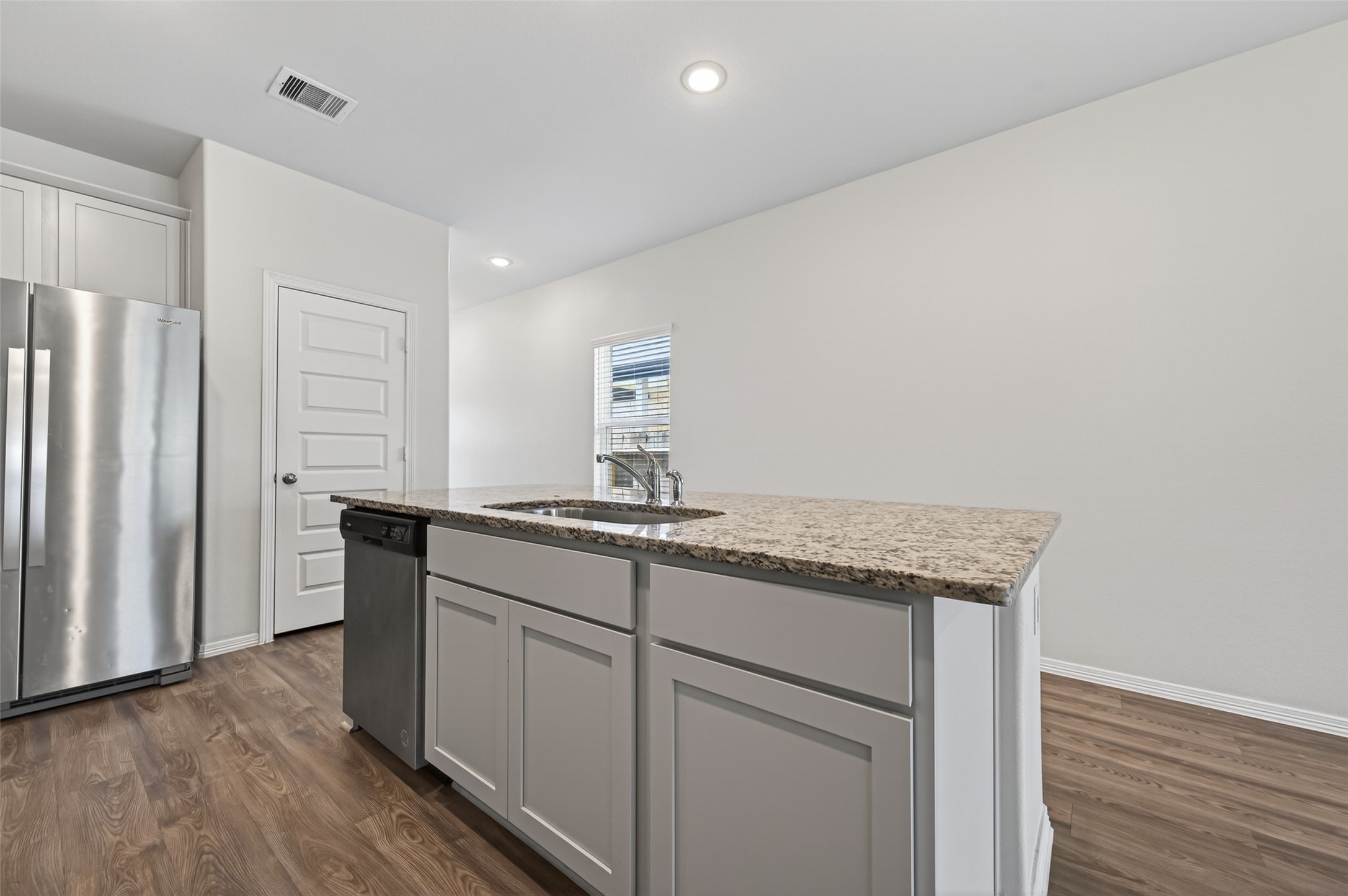 23222 Spring Genesis Lane Katy, TX 77493 - Photo 17 of 43 Stylish countertops and a dishwasher add convenience to this home.