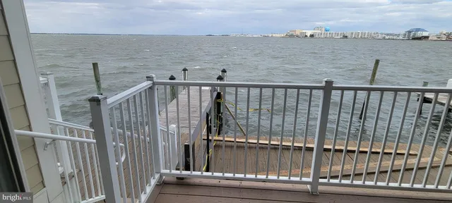 a view of balcony with wooden floor