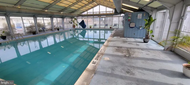a view of a street with cars on city street