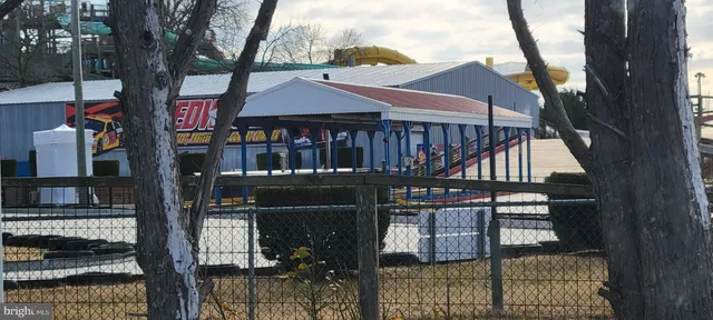 a view of a house with a street