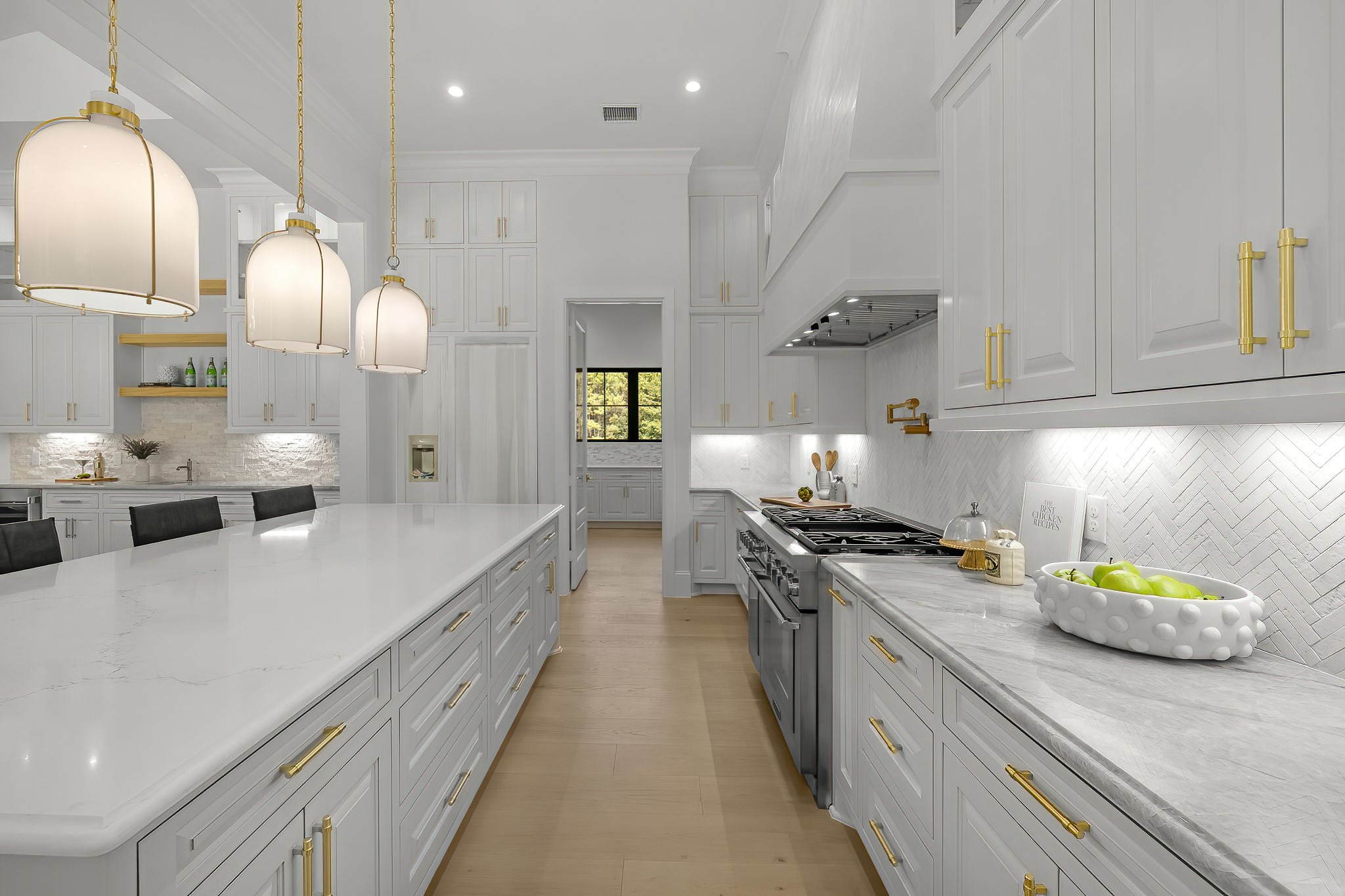 26041 Crown Ranch Boulevard Montgomery, TX 77316 - Photo 21 of 48 a kitchen with stainless steel appliances granite countertop a sink a stove and a wooden floors