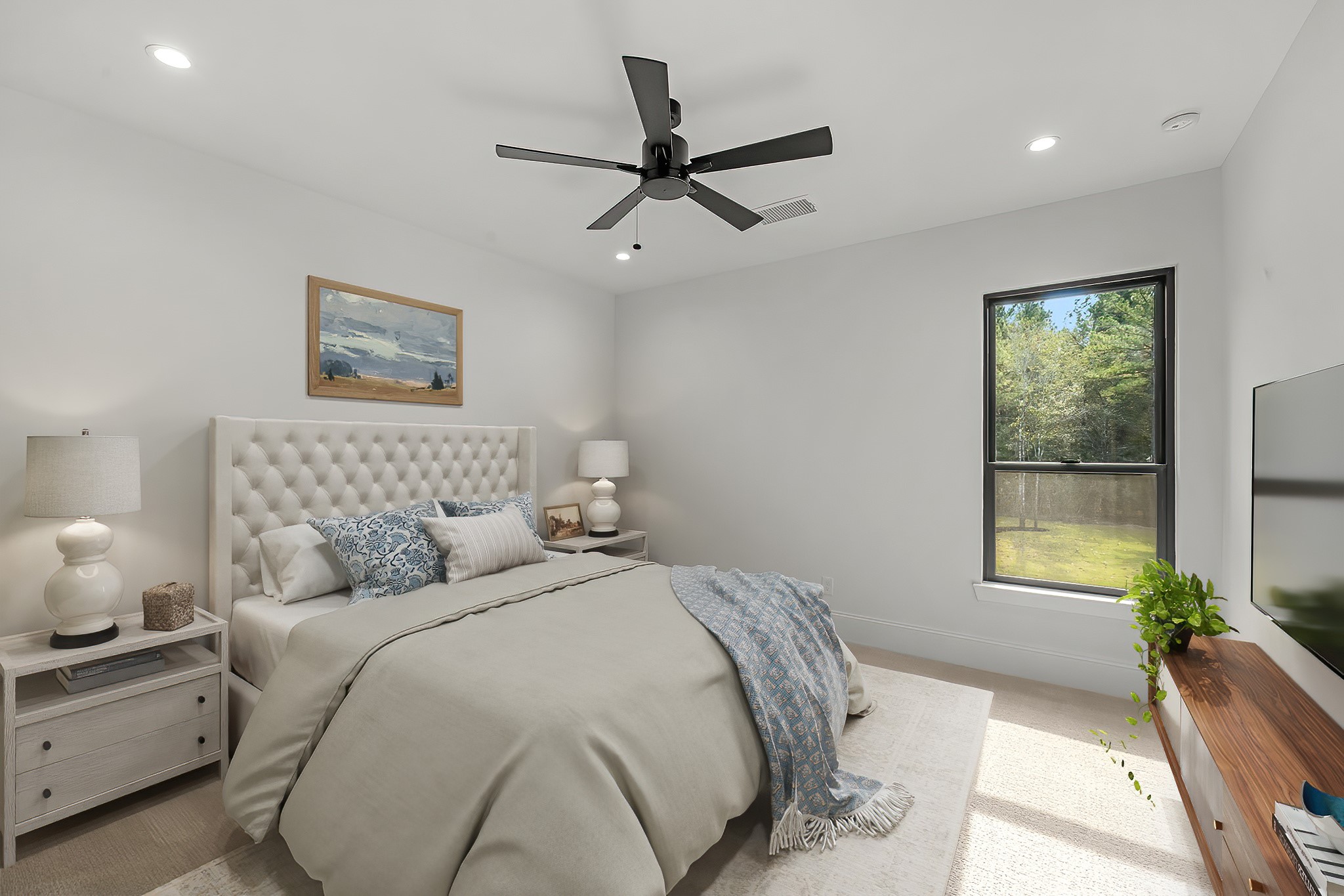 26041 Crown Ranch Boulevard Montgomery, TX 77316 - Photo 26 of 48 a bedroom with a bed and a large window