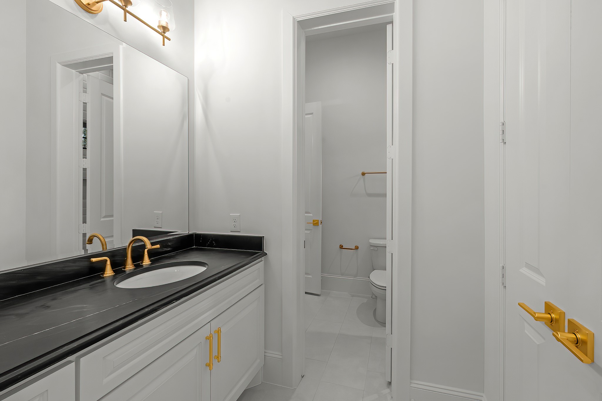 26041 Crown Ranch Boulevard Montgomery, TX 77316 - Photo 32 of 48 a close view of sink and tap