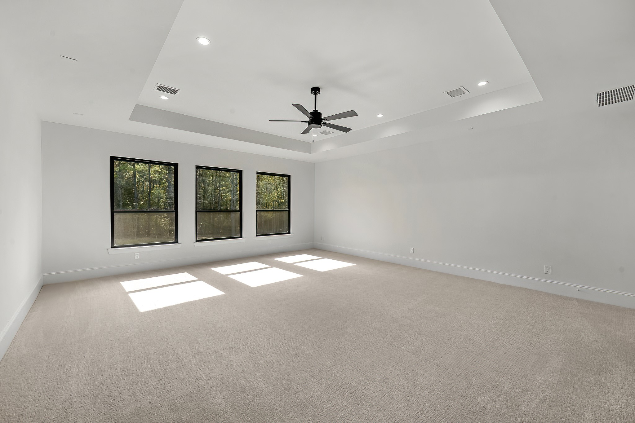 26041 Crown Ranch Boulevard Montgomery, TX 77316 - Photo 42 of 48 a view of a livingroom with a ceiling fan and window