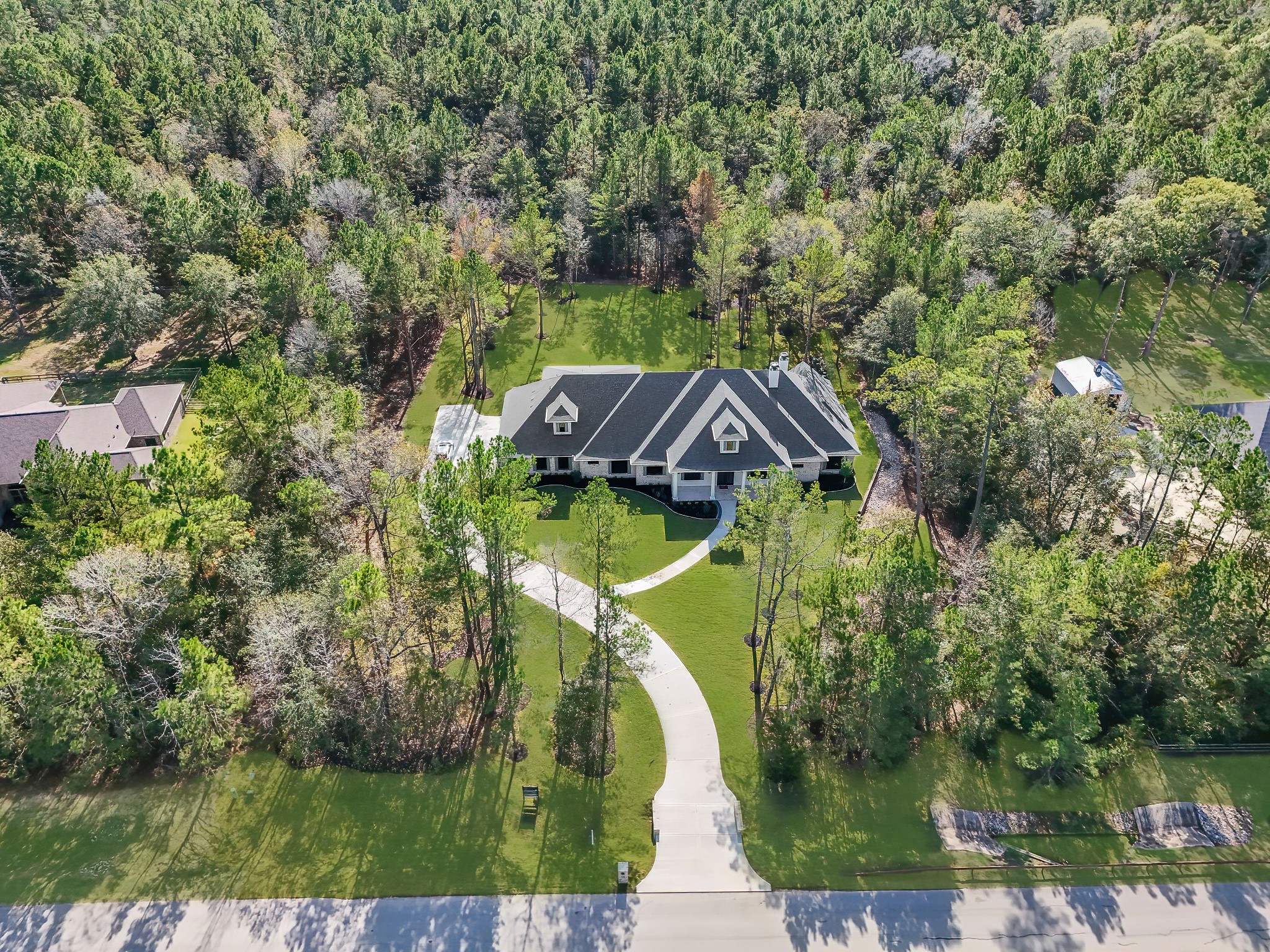 26041 Crown Ranch Boulevard Montgomery, TX 77316 - Photo 5 of 48 an aerial view of a house