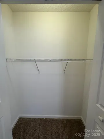 a view of small space with racks on the wall