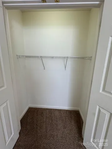 a view of small space with racks on the wall