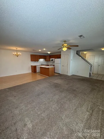 a view of a livingroom with a furniture
