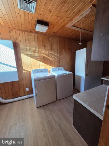 a utility room with washer and dryer