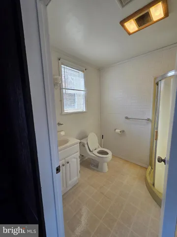 a bathroom with a sink and toilet