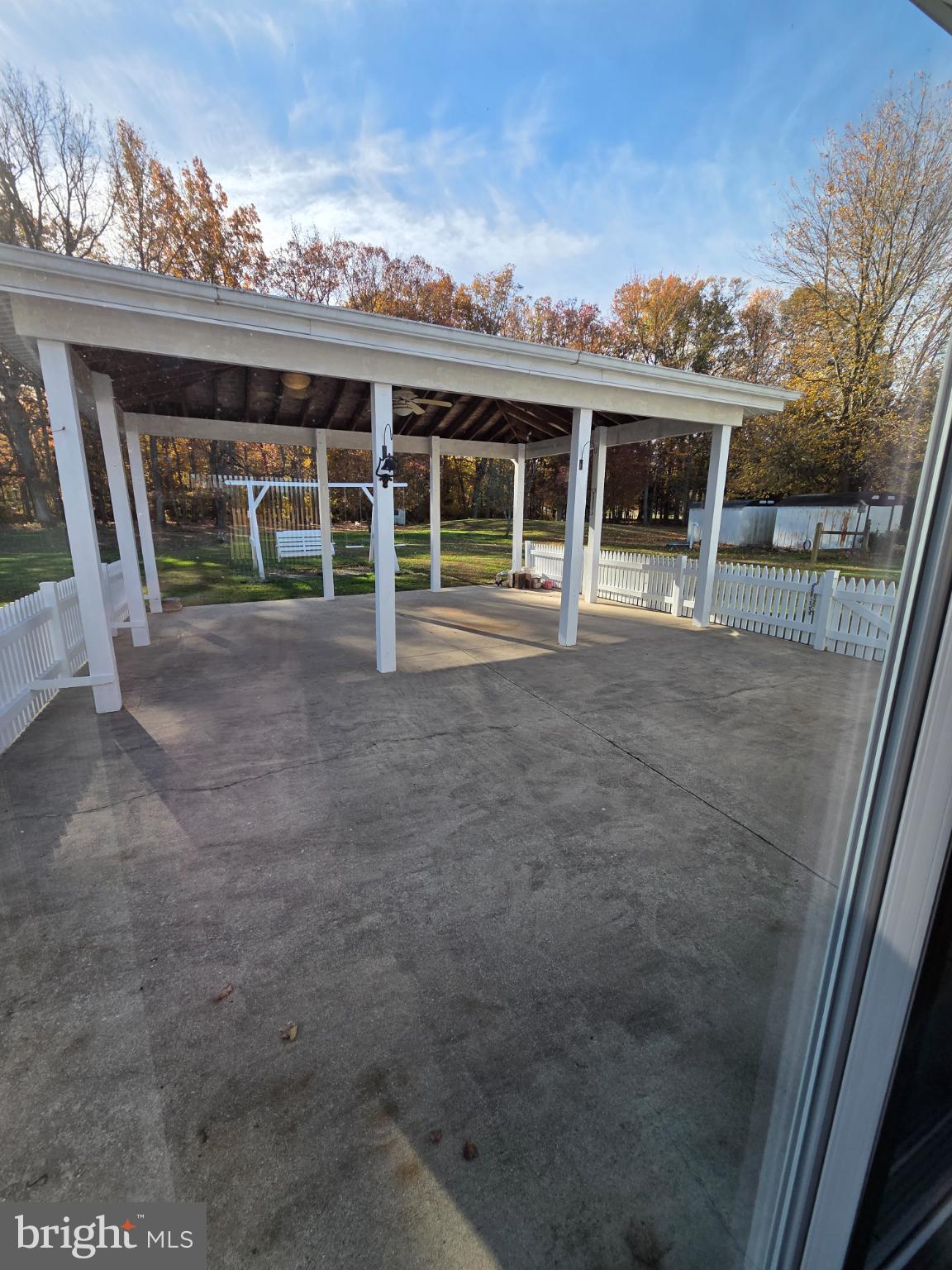 588 Gum Bush Road Townsend, DE 19734 - Photo 19 of 22 a view of a house with a porch and a table