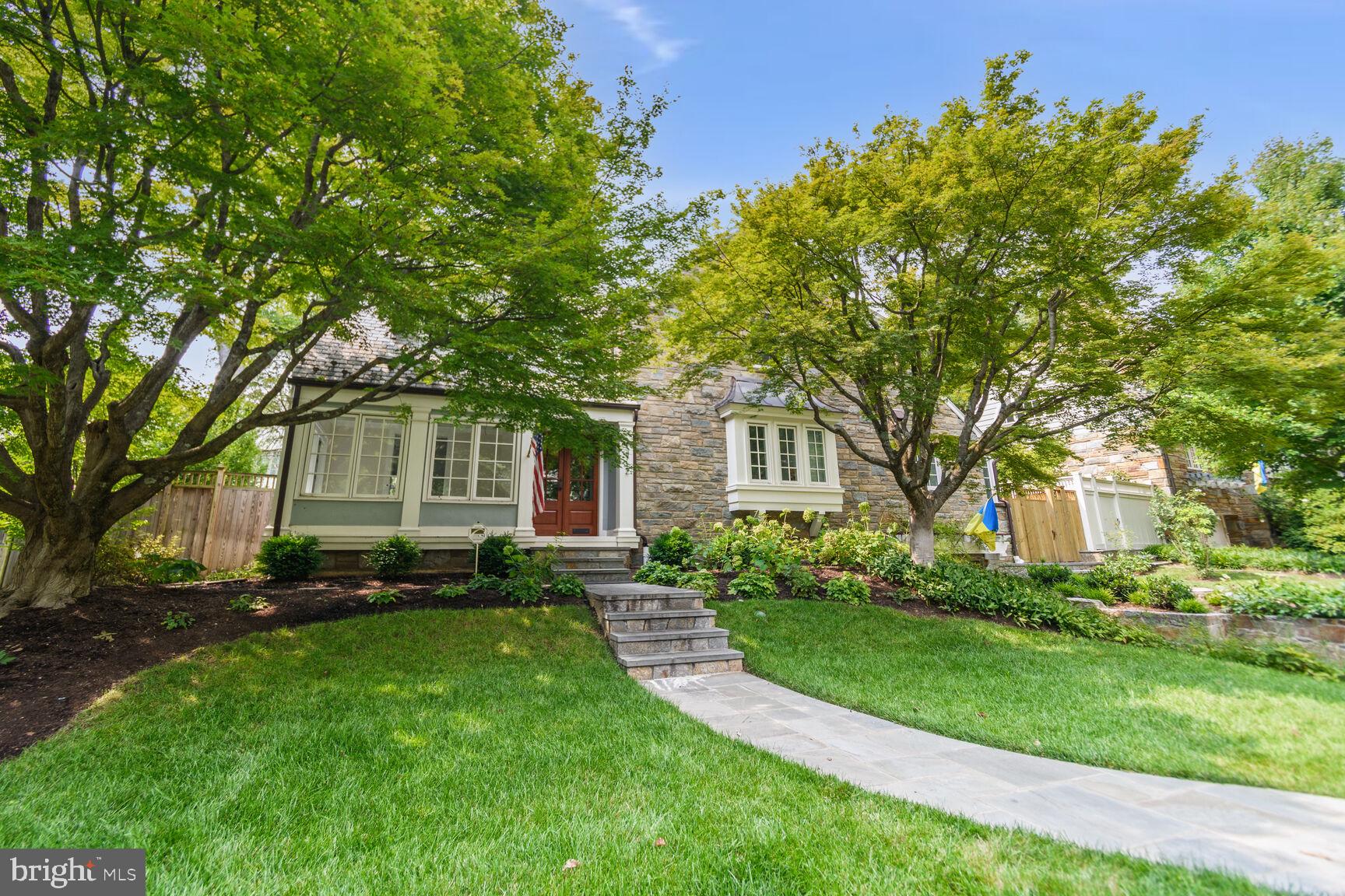3712 Fordham Road Northwest Washington, DC 20016 - Photo 2 of 45 Charming home with lush greenery.