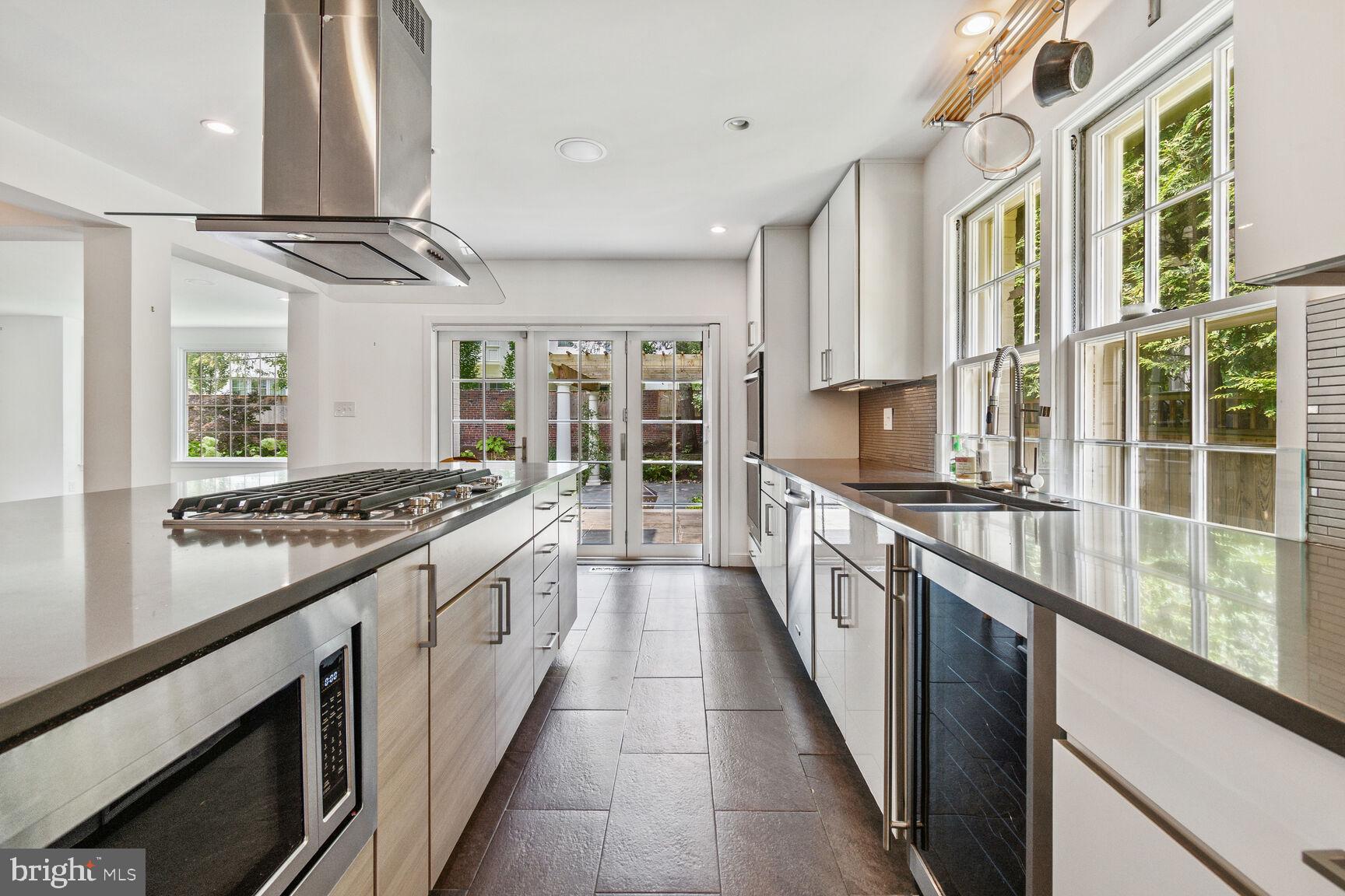 3712 Fordham Road Northwest Washington, DC 20016 - Photo 24 of 45 Sleek modern kitchen with natural light.