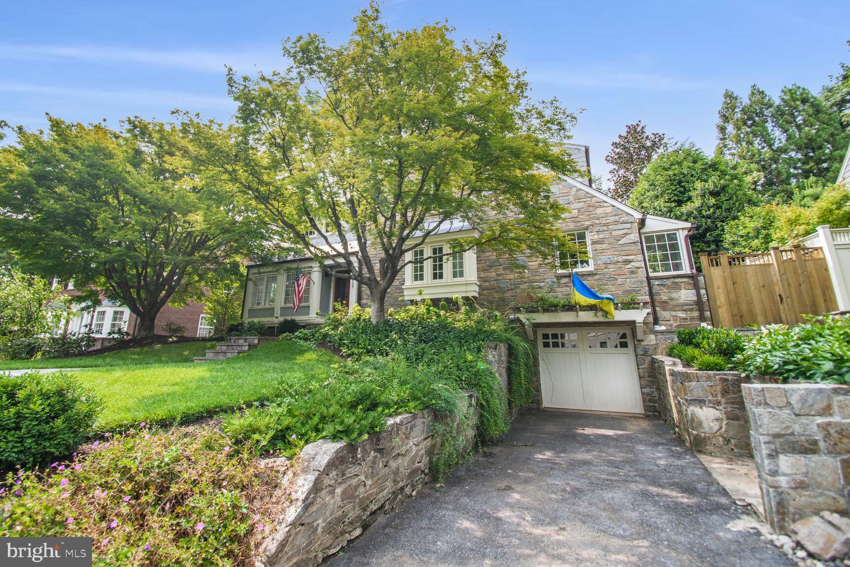 3712 Fordham Road Northwest Washington, DC 20016 - Photo 3 of 45 Charming stone home with lush greenery.