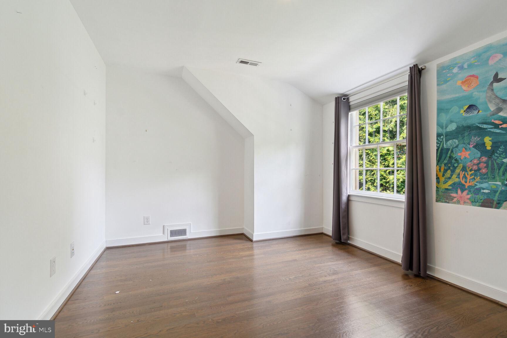 3712 Fordham Road Northwest Washington, DC 20016 - Photo 34 of 45 Bright, airy room with vibrant mural.