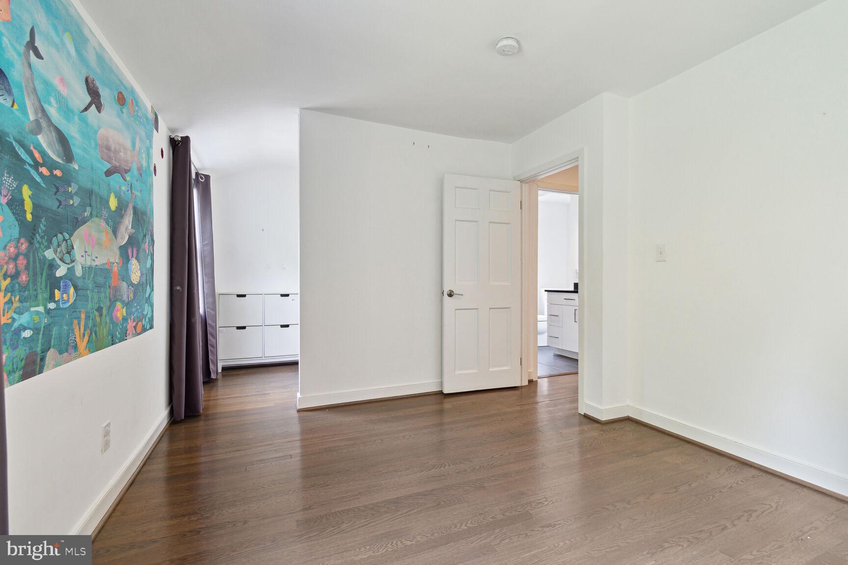 3712 Fordham Road Northwest Washington, DC 20016 - Photo 35 of 45 Bright, airy space with vibrant mural.