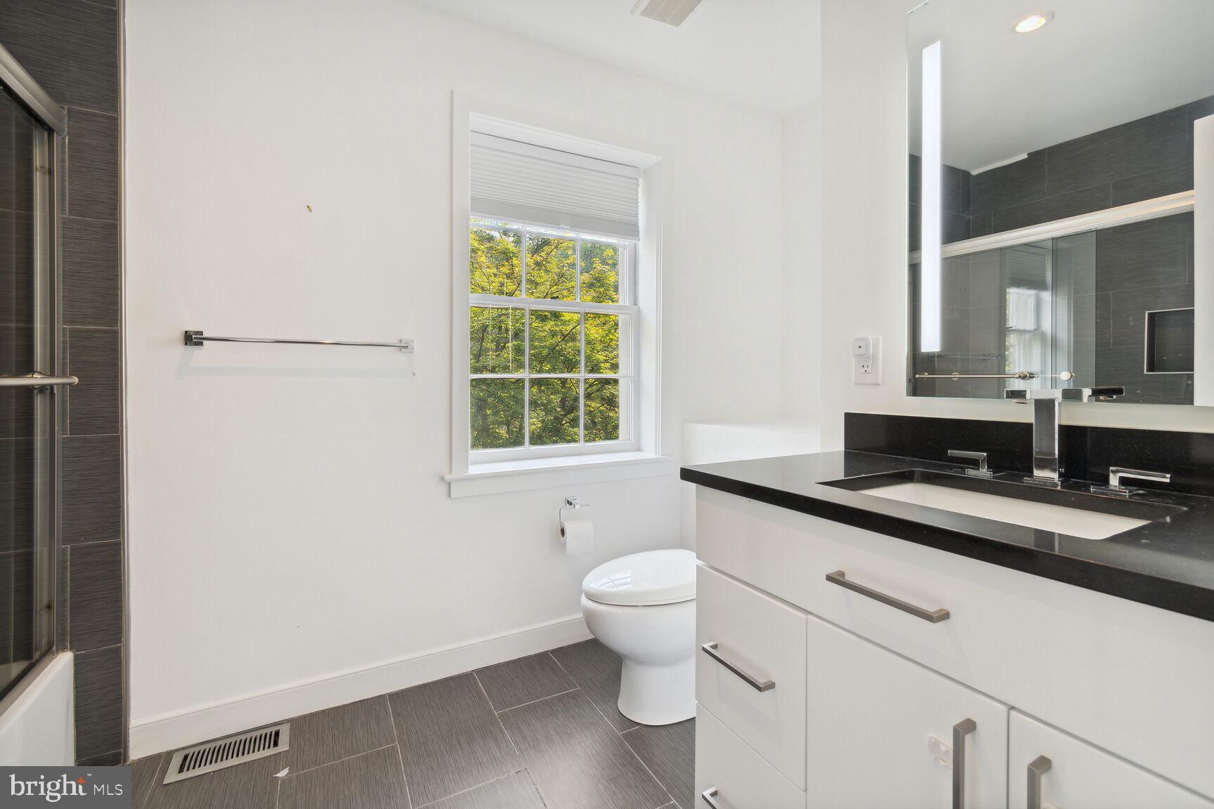 3712 Fordham Road Northwest Washington, DC 20016 - Photo 39 of 45 Modern bathroom with natural light.