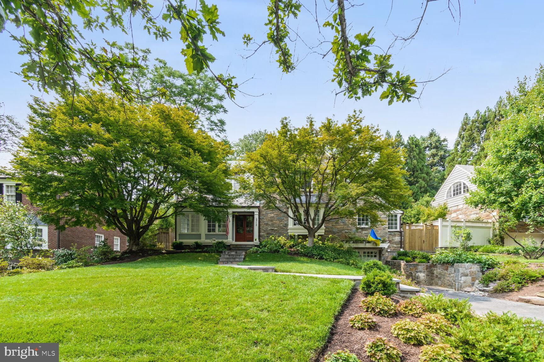 3712 Fordham Road Northwest Washington, DC 20016 - Photo 4 of 45 Charming home with lush greenery.