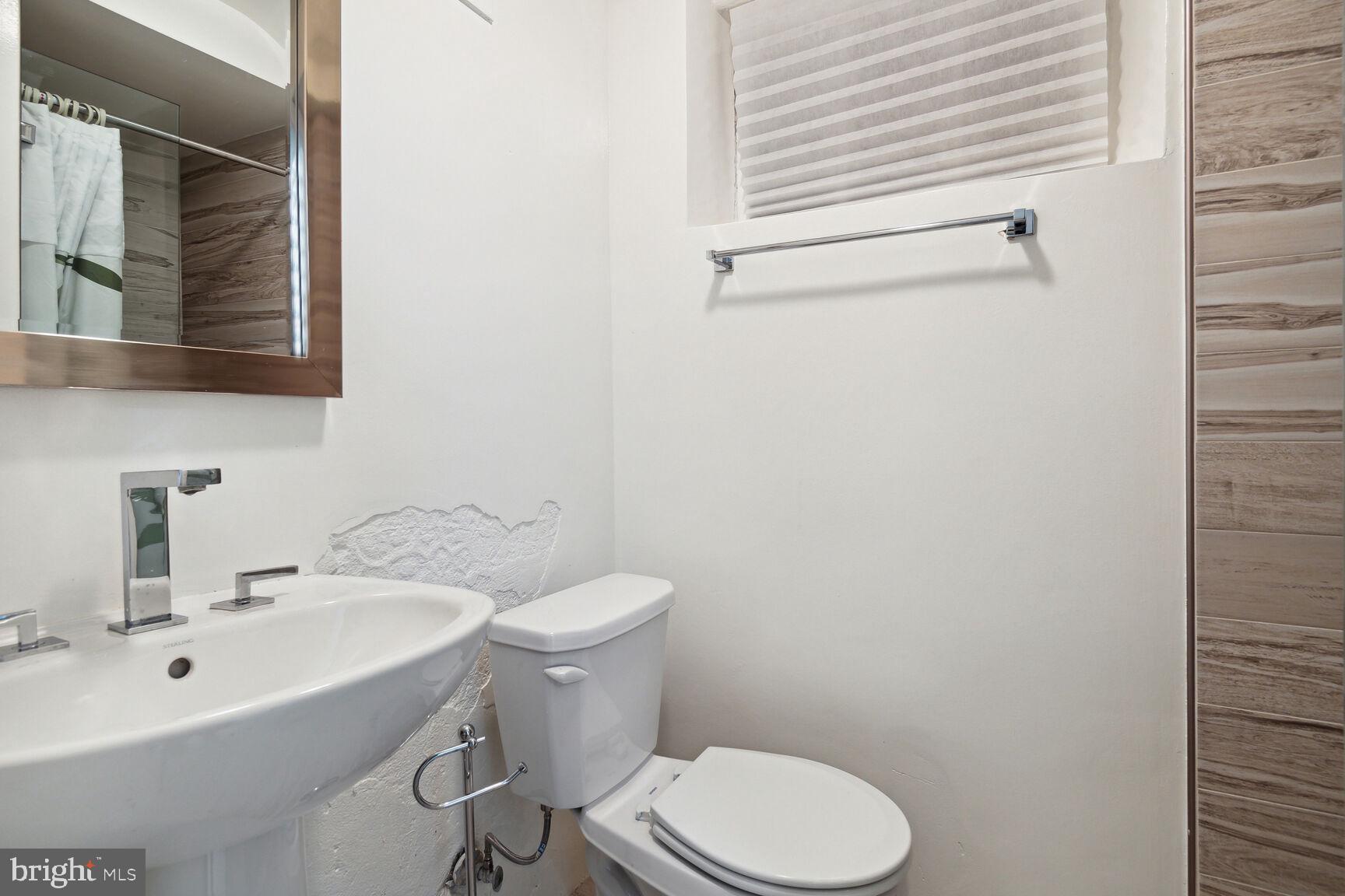 3712 Fordham Road Northwest Washington, DC 20016 - Photo 42 of 45 Sleek and modern bathroom retreat.