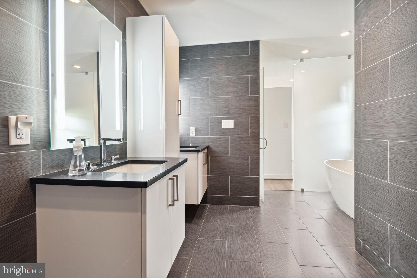 3712 Fordham Road Northwest Washington, DC 20016 - Photo 43 of 45 Sleek modern bathroom with elegant finishes.