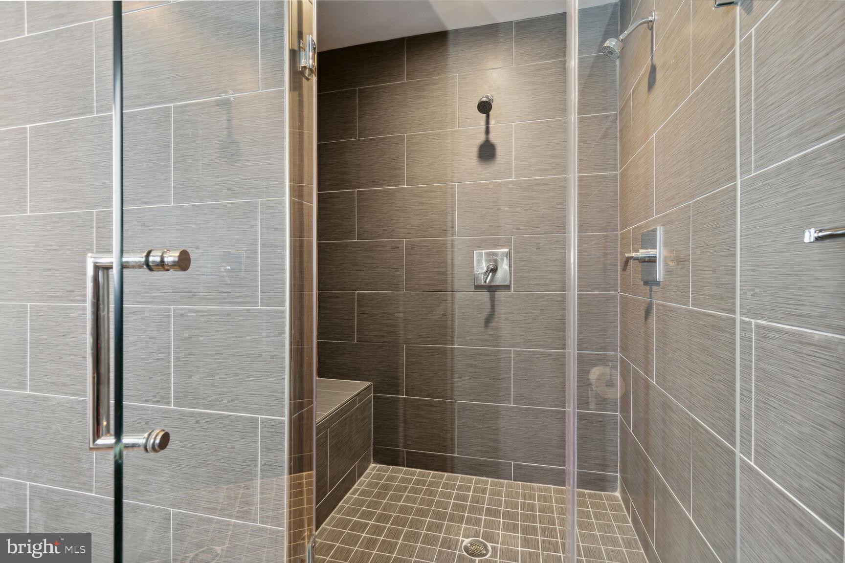 3712 Fordham Road Northwest Washington, DC 20016 - Photo 44 of 45 Sleek modern shower with elegant tiles.