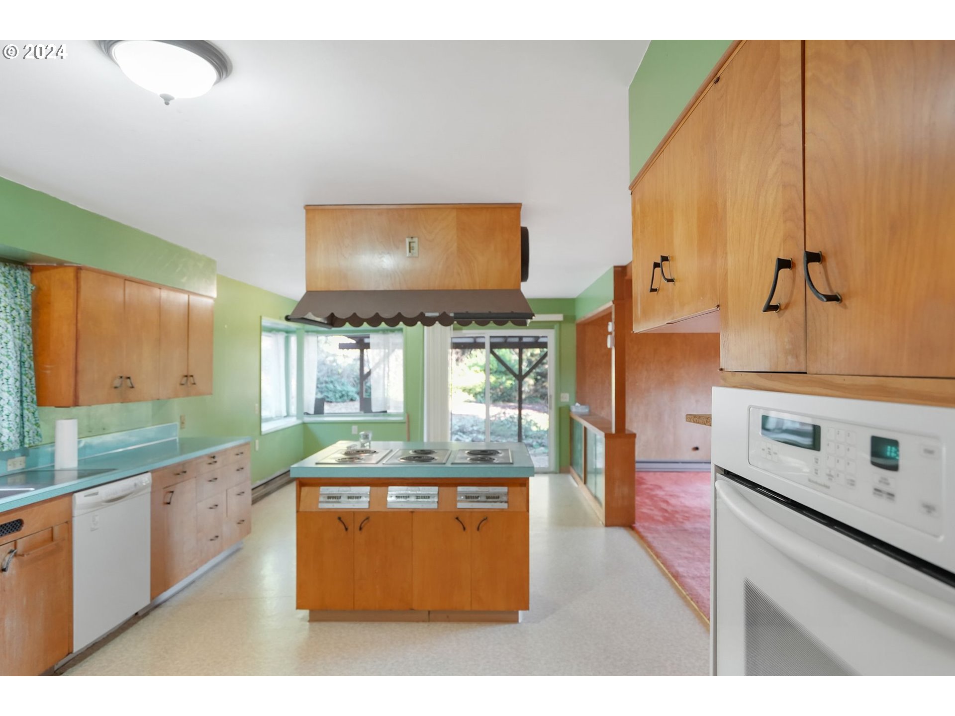 19237 Alsea Highway Alsea, OR 97324 - Photo 11 of 47 a kitchen with stainless steel appliances granite countertop a sink stove and cabinets