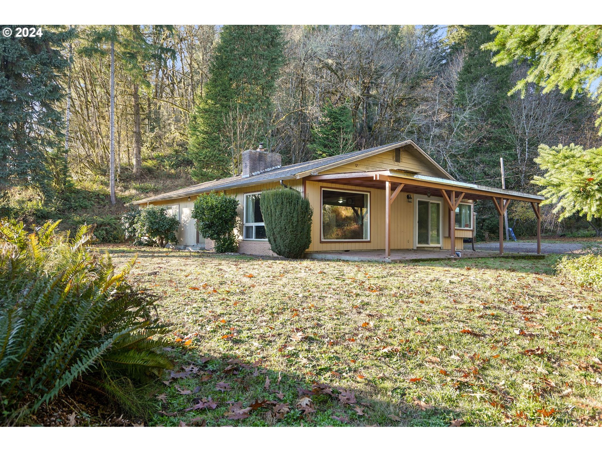 19237 Alsea Highway Alsea, OR 97324 - Photo 47 of 47 a front view of a house with a garden