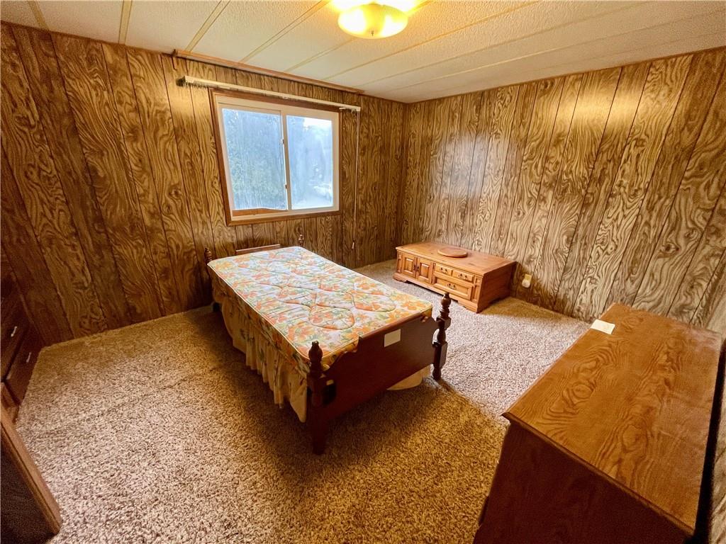 1305 Old State Road Apollo, PA 15613 - Photo 15 of 35 a bedroom with a bed and wooden floor