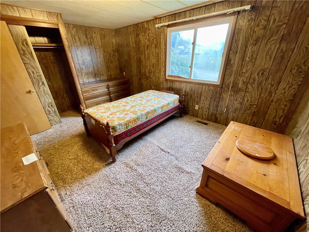 1305 Old State Road Apollo, PA 15613 - Photo 16 of 35 a bedroom with a bed and wooden floor