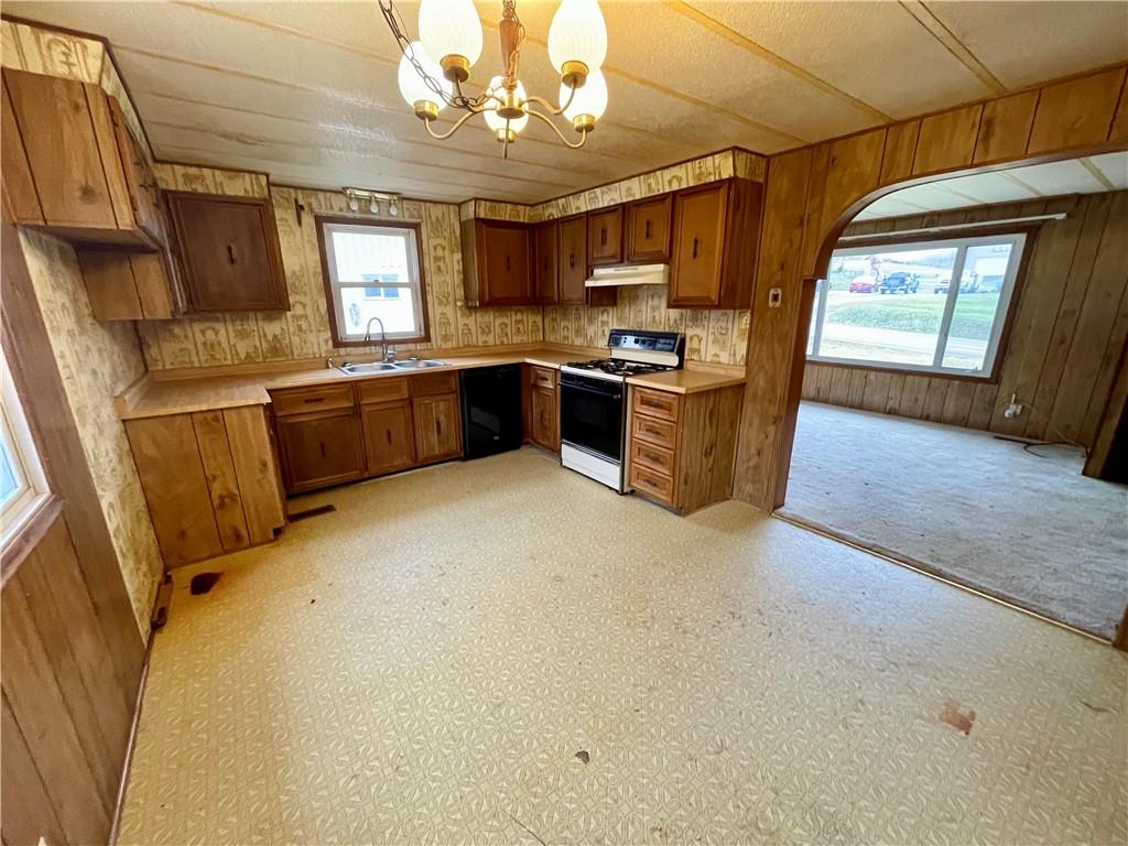 1305 Old State Road Apollo, PA 15613 - Photo 9 of 35 a kitchen with a stove a refrigerator and microwave