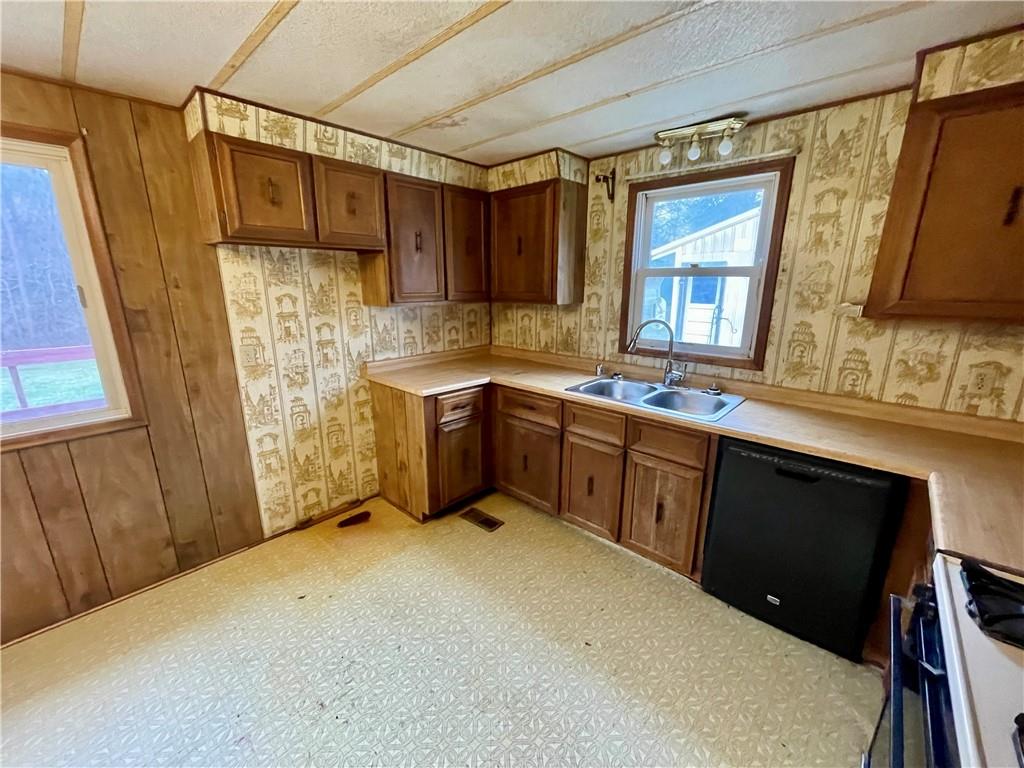 1305 Old State Road Apollo, PA 15613 - Photo 10 of 35 a kitchen with stainless steel appliances a sink stove and refrigerator