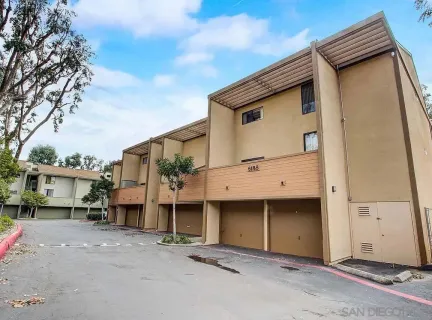 a front view of a house with a garage