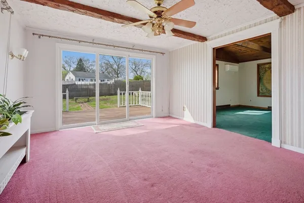 a view of a room with a large window